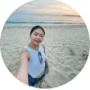 girl taking selfie on a beach