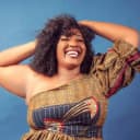 a woman of African descent posing for a headshot